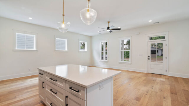 Spacious interior with minimalist design and abundant natural light.