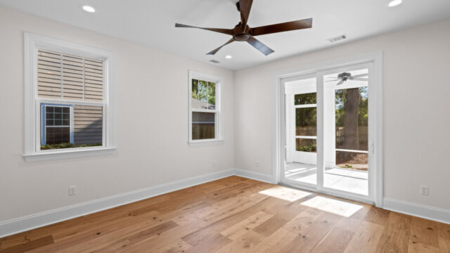 Light-filled interior space with neutral tones and sleek architectural details.