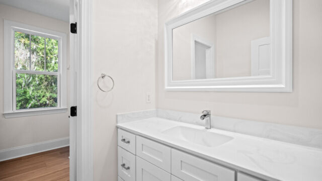 Modern residential interior showcasing an open-concept design and subtle décor accents.