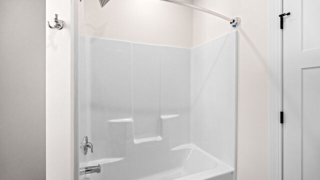 Modern residential interior showcasing an open-concept design and subtle décor accents.