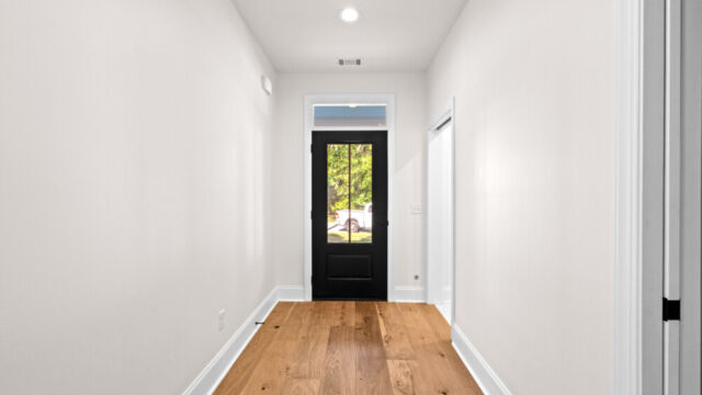 Modern residential interior showcasing an open-concept design and subtle décor accents.