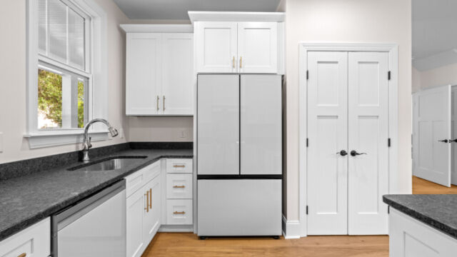 Modern residential interior showcasing an open-concept design and subtle décor accents.