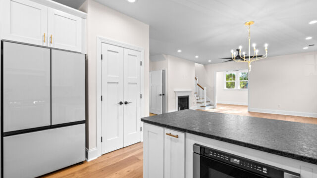 Modern residential interior showcasing an open-concept design and subtle décor accents.