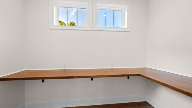 Modern residential interior showcasing an open-concept design and subtle décor accents.