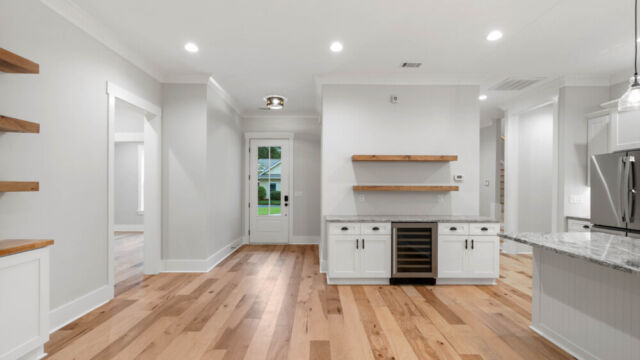 Interior of a home with contemporary design, ample lighting, and comfortable layout.