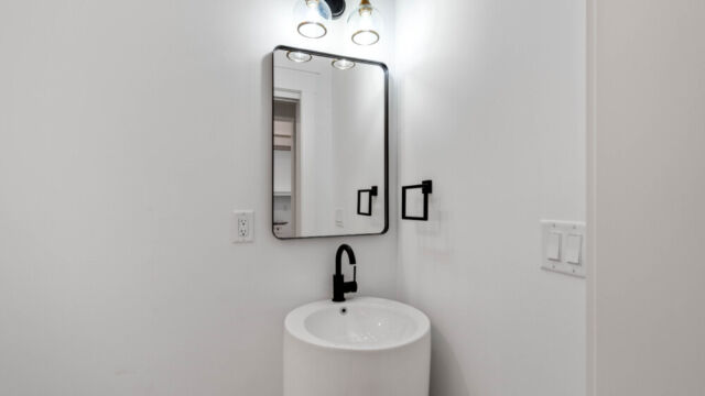 Powder room with clean, modern finishes.