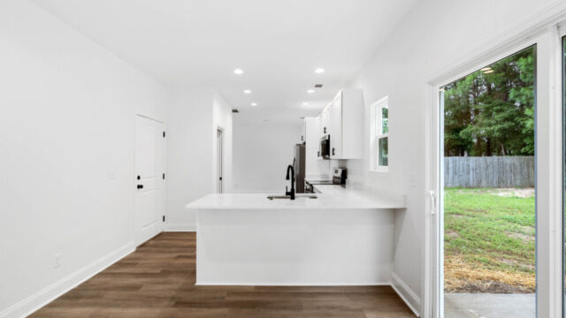 Custom Home by Coastal Homes and Sunrooms