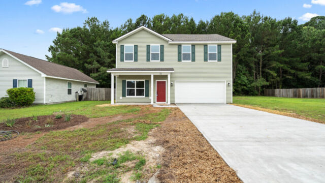Custom Home by Coastal Homes and Sunrooms
